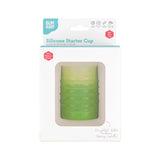 Bumkins Silicone Starter Cup: Sage is shown in a white packaging box, with a front window displaying the cup.