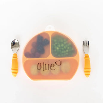 Ollies meal on Bumkins Silicone Stretch Lid Grip Plate with spoon & fork. CPSIA Compliant.