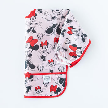 Bumkins Minnie Mouse baby blanket with red trim and a matching Sleeved Bib.