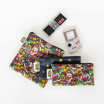 Colorful pouches with Nintendo characters and a Bumkins Silicone Teether shaped like an NES Controller on a Game Boy white background.