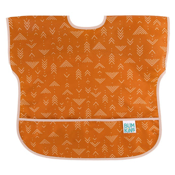 Bumkins Junior Bib: Grounded is made of orange waterproof fabric with a white arrow design, adjustable neck closure, and front pocket.