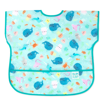 Bumkins Junior Bib: Ocean Life features teal waterproof fabric with a sea creature design, front pocket, and adjustable neck closure.