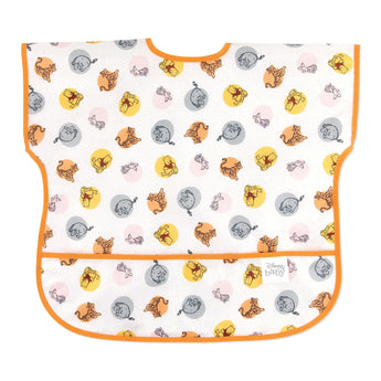 Bumkins Junior Bib: Winnie and Friends is made of white waterproof fabric with a colorful character design, orange trim, and front pocket.