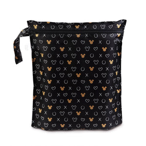 Bumkins Wet Bag: Minnie Mouse Icon Black + White is a black zippered waterproof pouch featuring Minnie Mouse silhouettes and white designs.