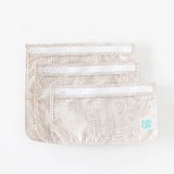 Bumkins Clear Travel Bag 3-Pack: Wander stacked largest to smallest on a white background.